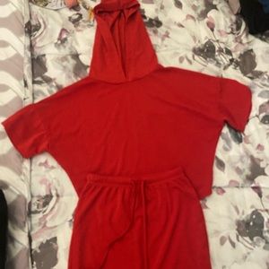 Red Hooded top with matching skirt.